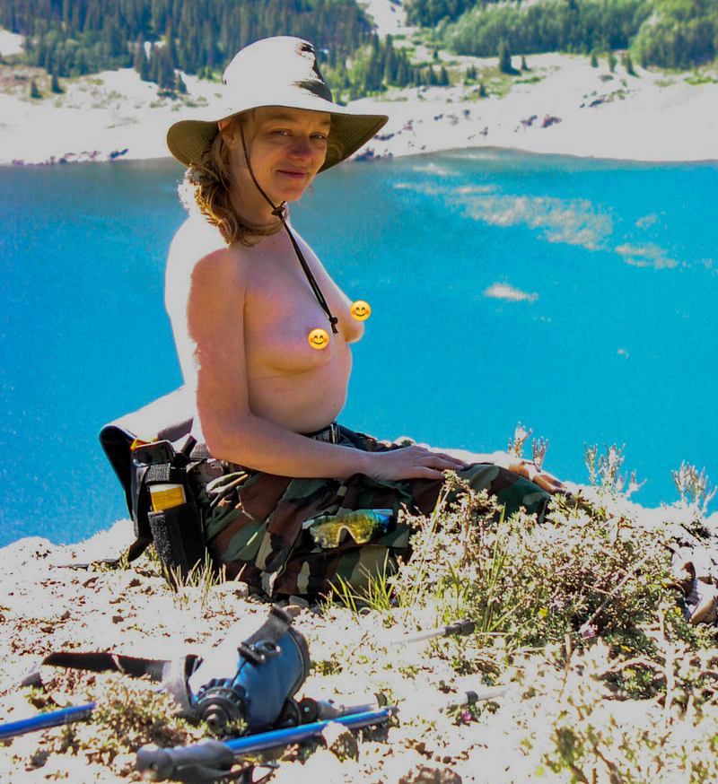 After scaling a peak, Lisa busts out her twin peaks